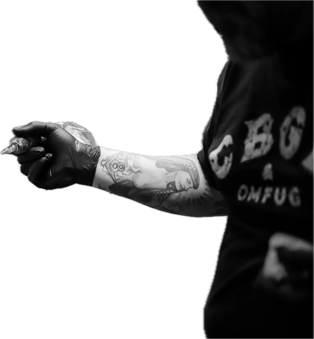 Tattooed forearm and fist