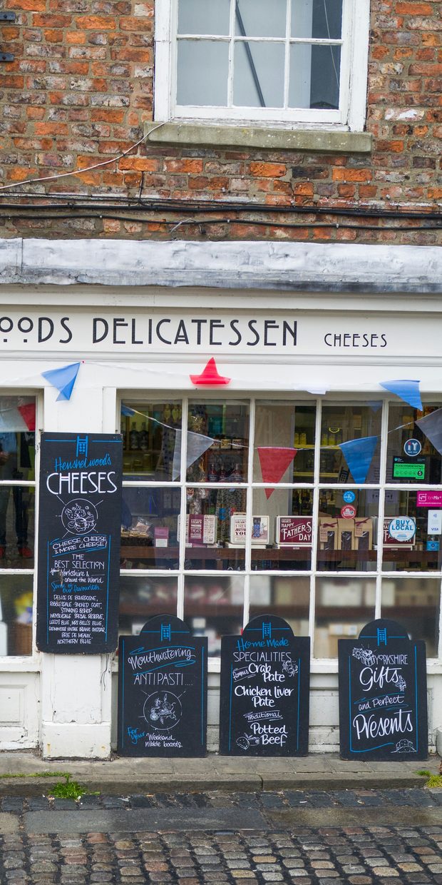 Independent delicatessen shopfront on a high street